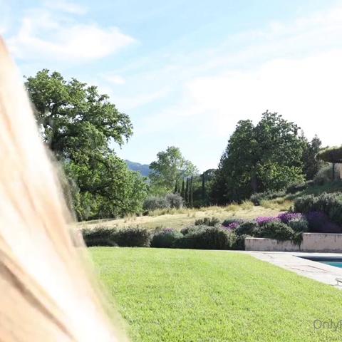 Caroline Zalog Trying On Clothes Outdoors