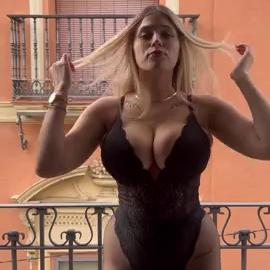 Camila Abril Posing On The Balcony In Sexy Dress